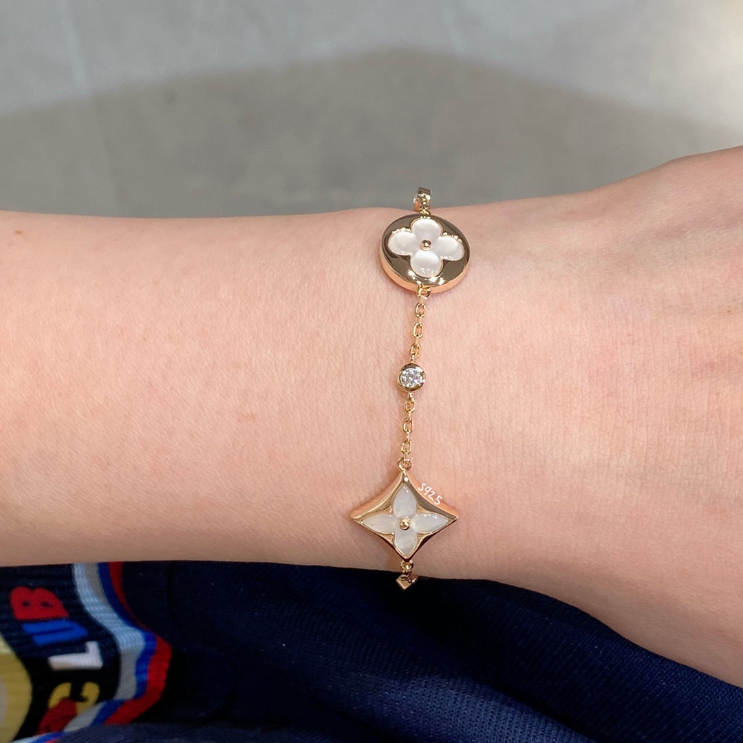 [✨ROSE✨]STAR AND SUN 4 MOTIF WHITE MOP PINK GOLD BRACELET